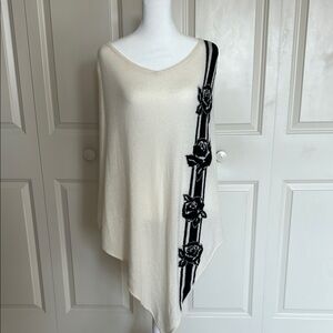 Elegant Cream Poncho with Black Rose Design